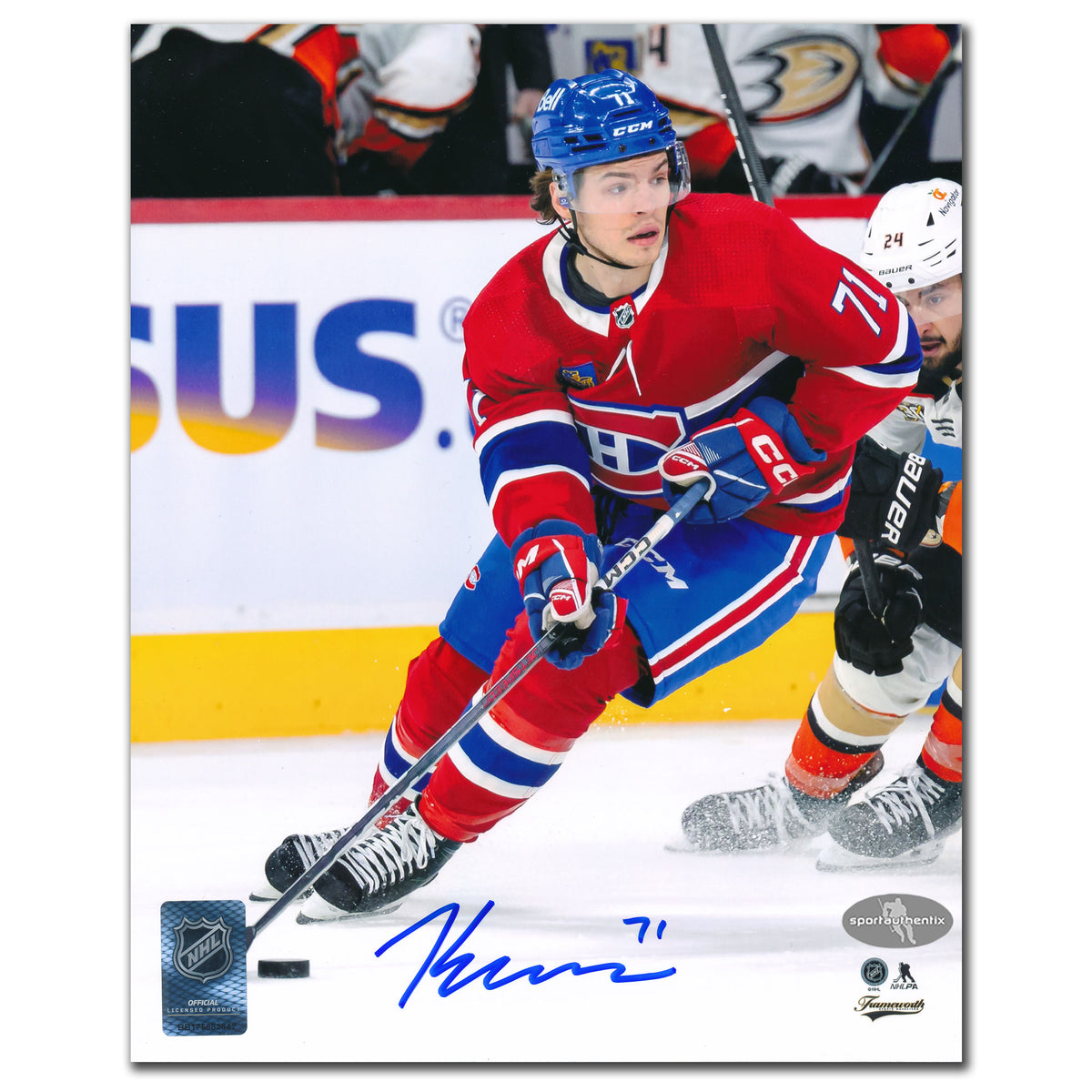 Jake Evans, Canadiens, skating in red—featured on an autographed 8x10 photo titled Driving Up Ice.