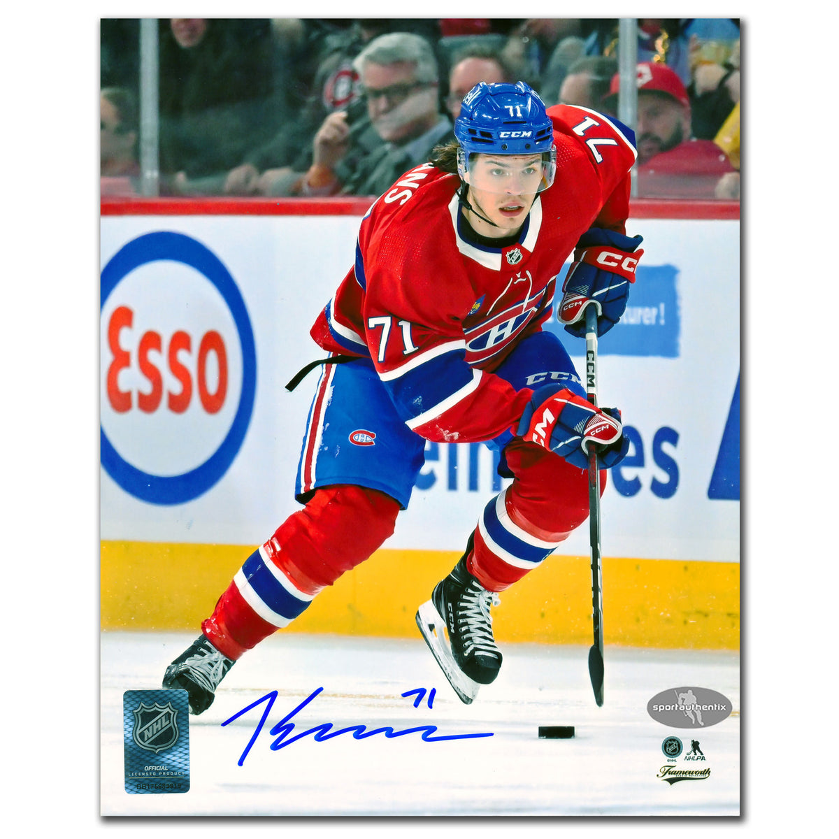 Jake Evans autographed 8x10 photo shows him on the rush in the Montreal Canadiens jersey—a prized signed collectible for fans.