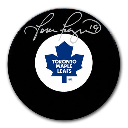 Tom Fergus Toronto Maple Leafs signed hockey puck with visible autograph—ideal collectible for any sports memorabilia enthusiast.