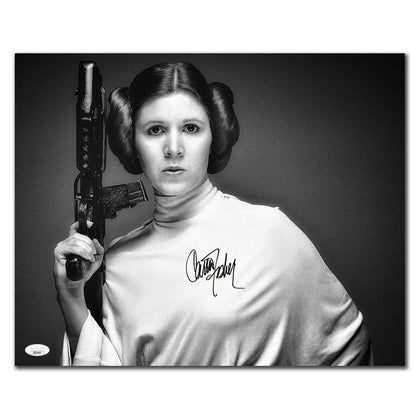 Black & white 16x20 autographed photo of Carrie Fisher as Princess Leia holding a blaster, STAR WARS JSA COA included.