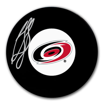 Ron Francis Carolina Hurricanes signed hockey puck featuring his autograph—an authentic collectors item for fans and memorabilia enthusiasts.