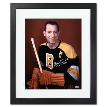 Framed 26x32 display featuring Milt Schmidts autograph, showcasing Boston Bruins Captain memorabilia in a sleek presentation.