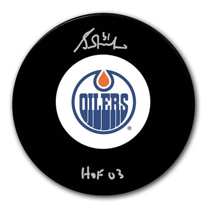 Autographed Edmonton Oilers hockey puck featuring Grant Fuhrs signature, HOF 03 inscription, and the official team logo.