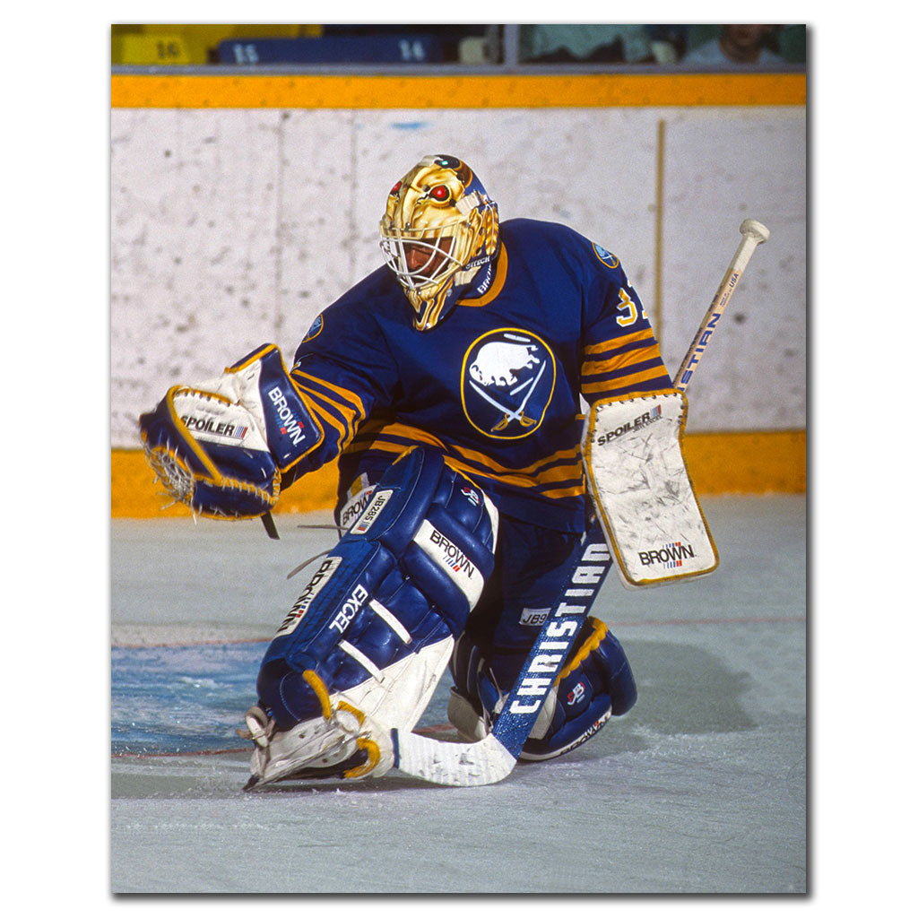 Grant Fuhr making a save in a blue Buffalo Sabres uniform