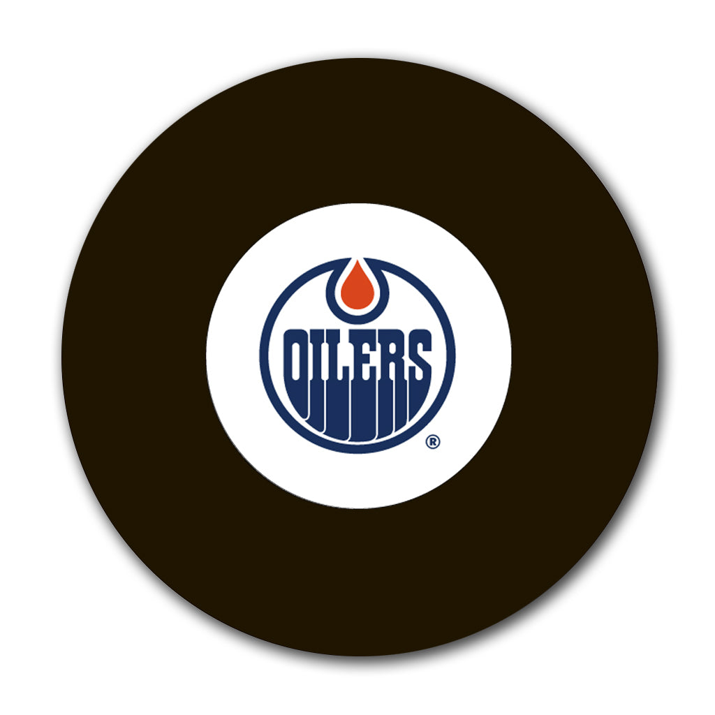Edmonton Oilers logo hockey puck for an upcoming Grant Fuhr autograph signing