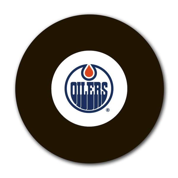Edmonton Oilers logo hockey puck for an upcoming Grant Fuhr autograph signing