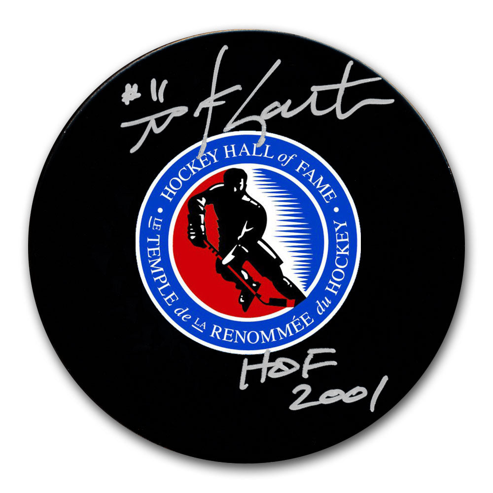 Mike Gartner autographed Hockey Hall of Fame hockey puck with HOF 2001 inscription