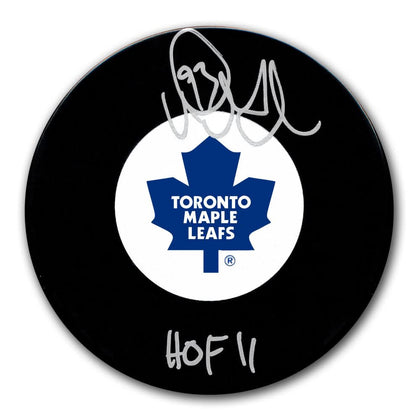Doug Gilmour Toronto Maple Leafs HOF signed black hockey puck featuring his autograph in silver—perfect for collectors.
