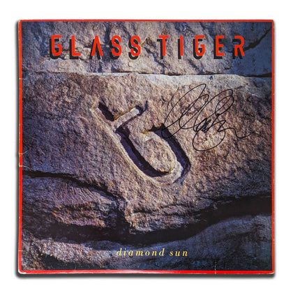 Alan Frew autographed Glass Tiger DIAMOND SUN vinyl LP, featuring a carved stone symbol cover and signed album artwork.