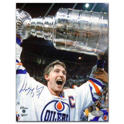 Autographed 8x10 photo of Wayne Gretzky celebrating with the 1984 Stanley Cup, featuring his signature in Edmonton Oilers gear.