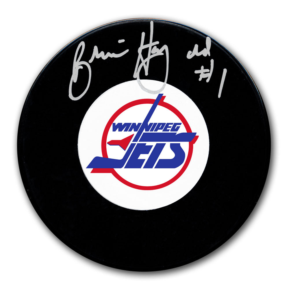 Brian Hayward autographed Winnipeg Jets hockey puck with vintage team logo and silver signature