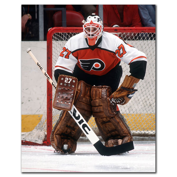 Ron Hextall Philadelphia Flyers 8x10 hockey photo in a white and orange goalie uniform standing in front of the net for autograph pre-order
