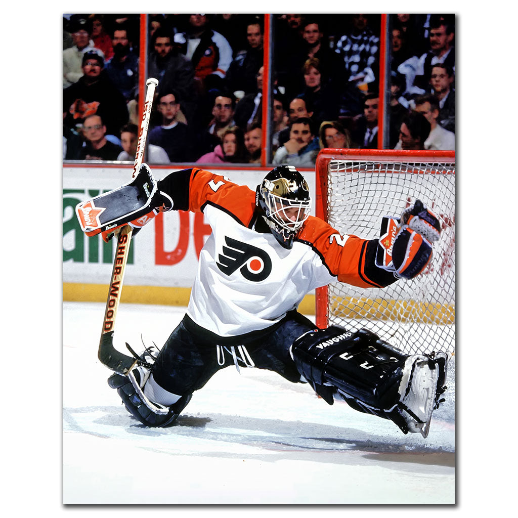 Ron Hextall Philadelphia Flyers 8x10 hockey photo in a white goalie uniform making a split save in front of the net for autograph pre-order