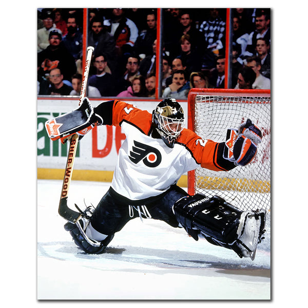 Ron Hextall Philadelphia Flyers 8x10 hockey photo in a white goalie uniform making a split save in front of the net for autograph pre-order