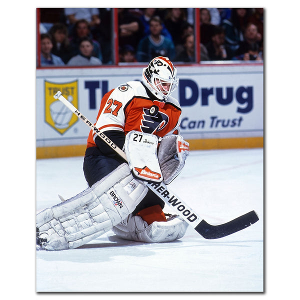 Ron Hextall Philadelphia Flyers 8x10 hockey photo in a white goalie uniform making a pad save during an NHL game for autograph pre-order