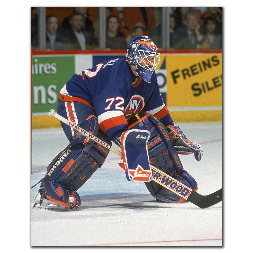 Ron Hextall New York Islanders 8x10 hockey photo in a blue goalie uniform positioned in front of the net for autograph pre-order