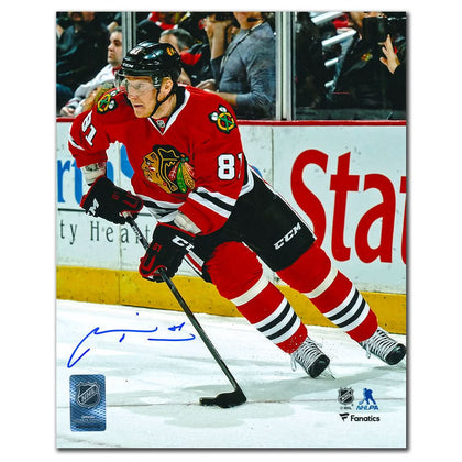 An autographed 8x10 action photo of Marian Hossa with a visible signature, featuring Chicago Blackhawks BREAKOUT branding and a Certificate of Authenticity.