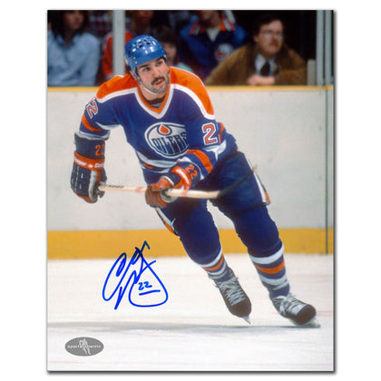 Charlie Huddy Edmonton Oilers signed 8x10 action photo with autograph, perfect memorabilia for dedicated Oilers collectors.