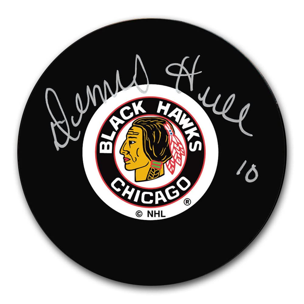Dennis Hull Chicago Blackhawks signed hockey puck, featuring bold silver autograph, collectible with certificate of authenticity.