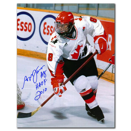 8x10 autographed photo of Angela James in Team Canada white jersey, inscribed “HOF 2010,” includes COA.