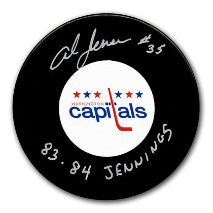 Signed hockey puck featuring Al Jensens autograph, dated 1984 Jennings, with Capitals logo; premium sports memorabilia.