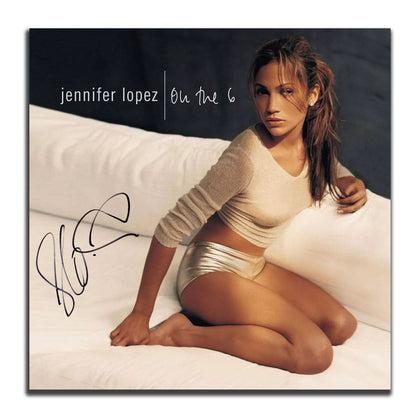 Autographed ON THE 6 vinyl record album cover featuring Jennifer Lopezs signature and a visible JSA COA authentication sticker.