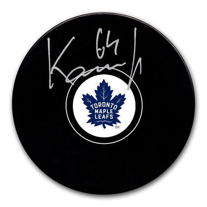 David Kampf Toronto Maple Leafs signed hockey puck—official memorabilia with his silver autograph on the rubber puck’s surface.