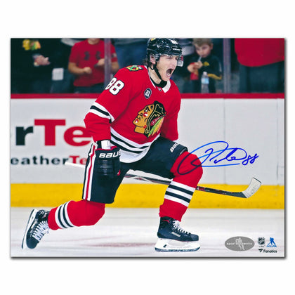 Patrick Kane Chicago Blackhawks signed 8x10 photo, featuring his autograph and image celebrating on ice in a red jersey, mouth open.
