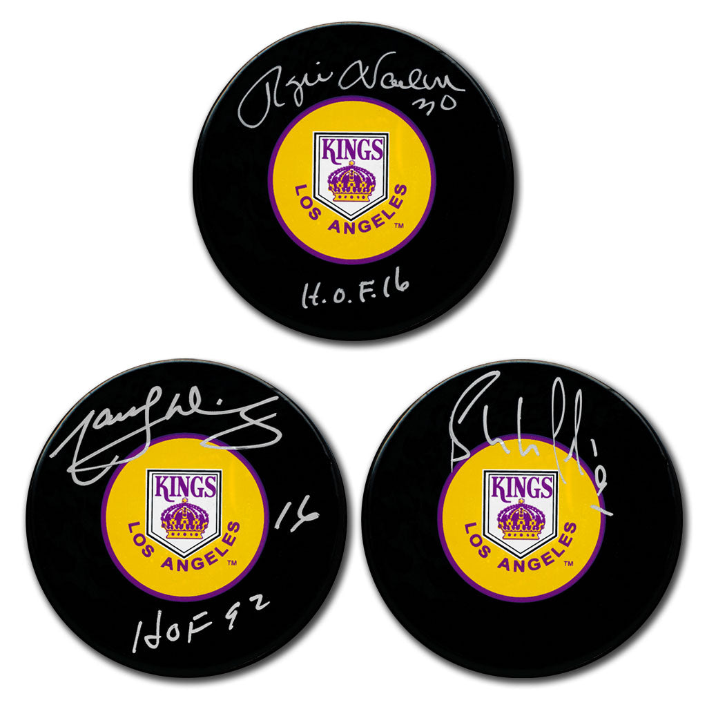 Rogie Vachon Marcel Dionne and Bernie Nicholls autographed Los Angeles Kings hockey puck bundle with Hall of Fame inscriptions