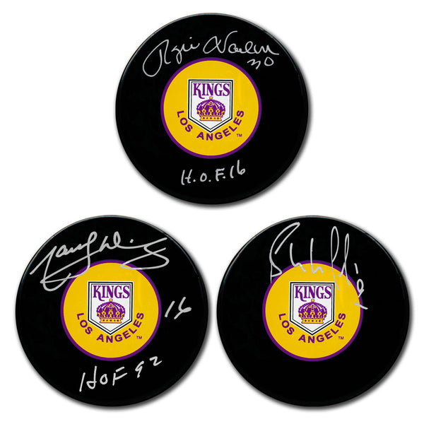 Rogie Vachon Marcel Dionne and Bernie Nicholls autographed Los Angeles Kings hockey puck bundle with Hall of Fame inscriptions