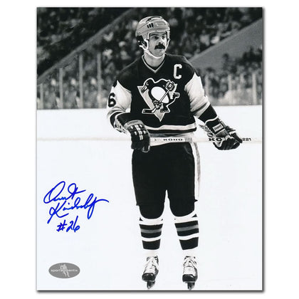 Signed 8x10 black-and-white photo of Penguins CAPTAIN Orest Kindrachuk, featuring his blue ink autograph on the photograph.