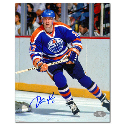 Jari Kurri Edmonton Oilers hand-signed 8x10 action photo—premium autographed collectible in crisp photographic format.
