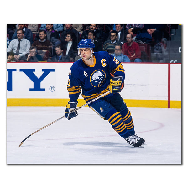 Pat LaFontaine skating in a blue Buffalo Sabres uniform