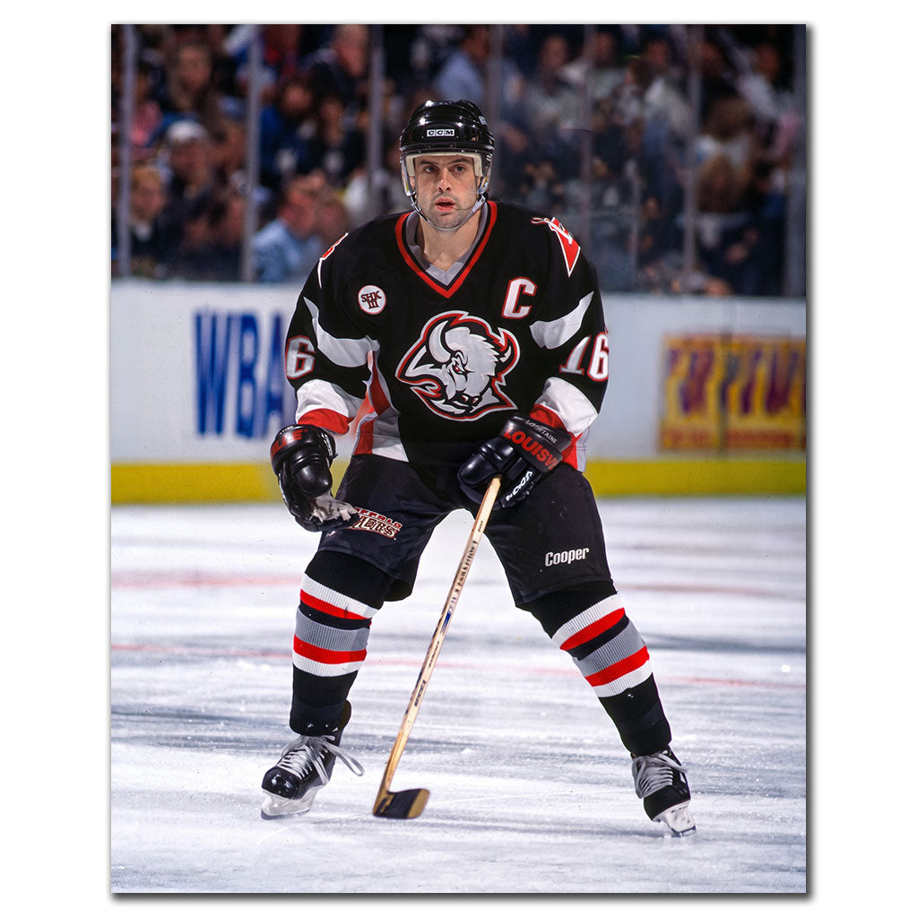 Pat LaFontaine on the ice in a black Buffalo Sabres uniform