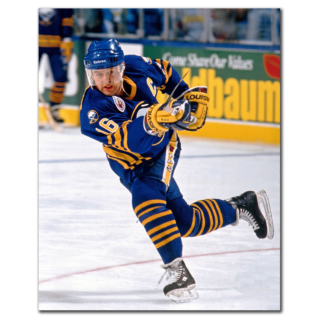 Pat LaFontaine taking a shot in a blue Buffalo Sabres uniform