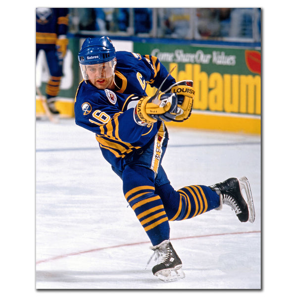 Pat LaFontaine taking a shot in a blue Buffalo Sabres uniform