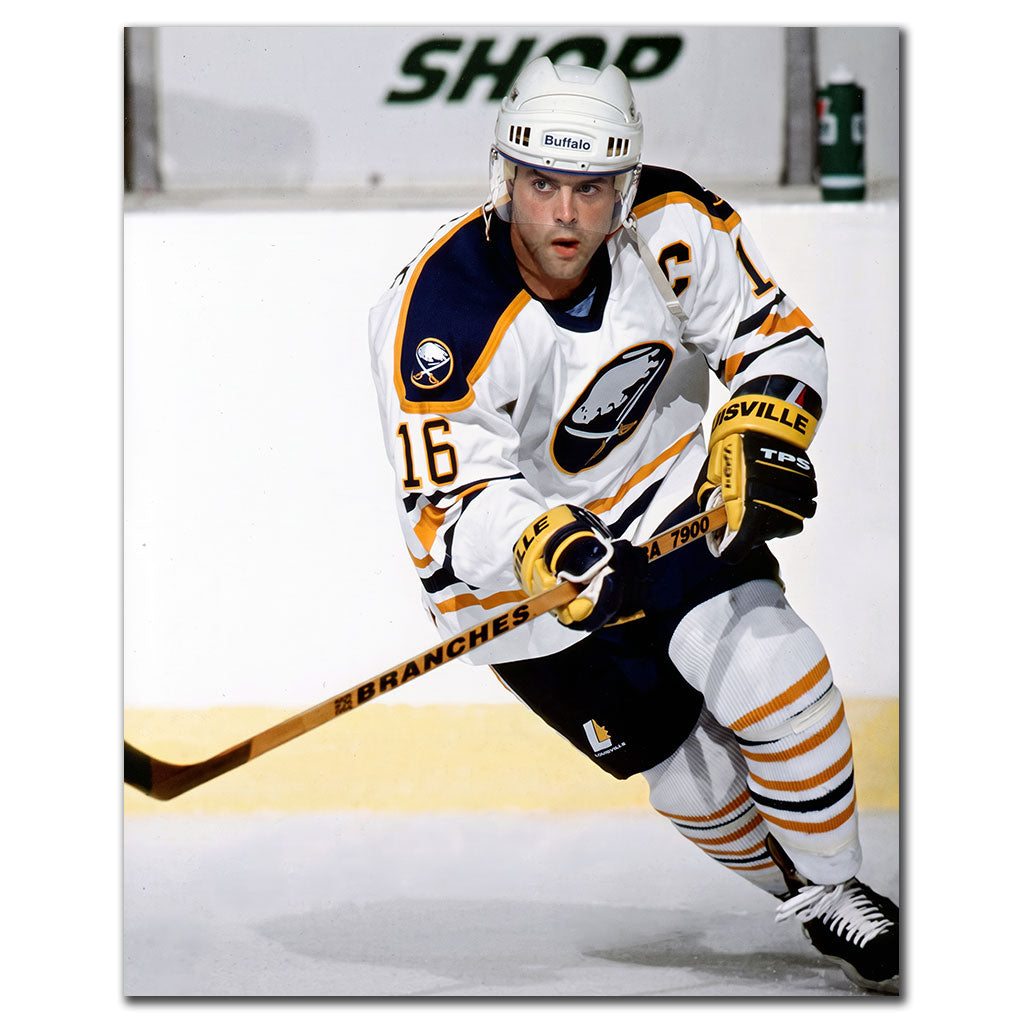 Pat LaFontaine skating in a white Buffalo Sabres uniform