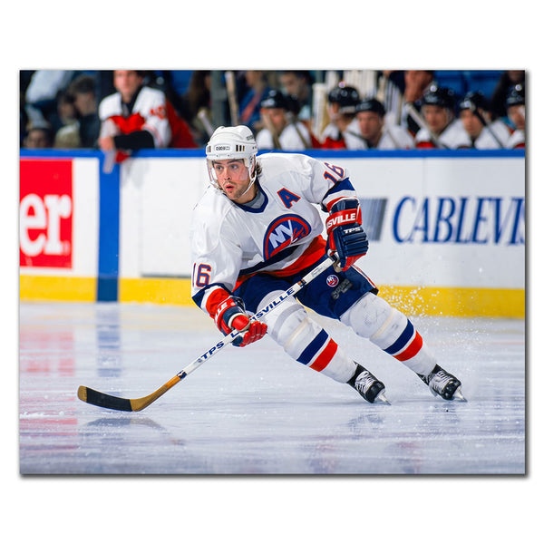 Pat LaFontaine skating in a white New York Islanders uniform