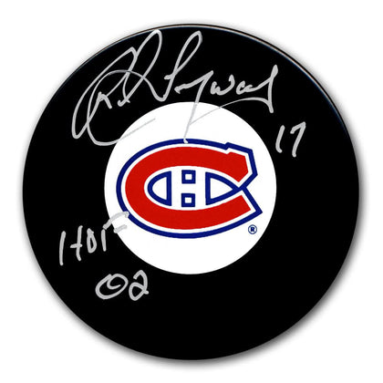 Rod Langway Montreal Canadiens HOF signed hockey puck, features silver autograph, #17 and 02 inscription on the puck’s surface.