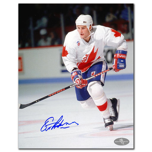 Eric Lindros autographed Team Canada 1991 Canada Cup 8x10 photo in white jersey skating on the ice