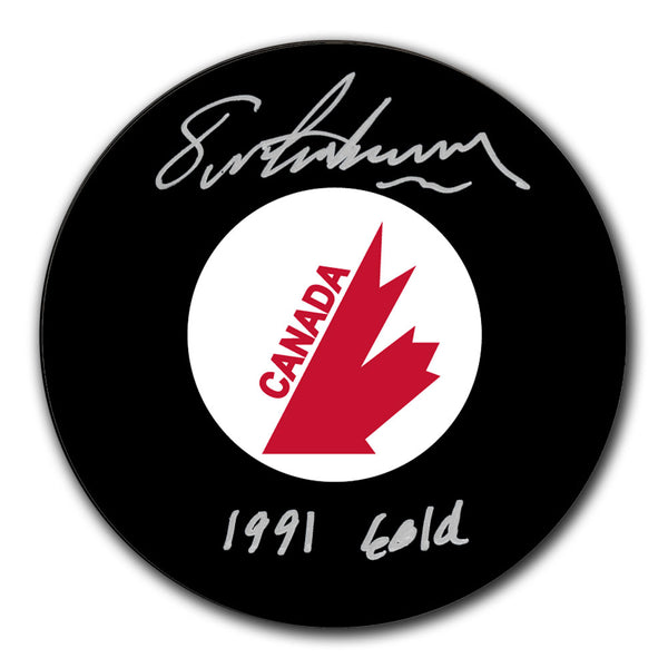 Eric Lindros autographed Team Canada Canada Cup hockey puck with 1991 Gold inscription