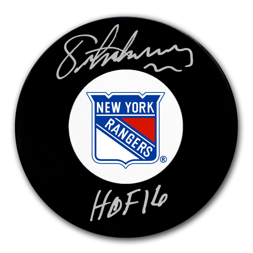 Eric Lindros autographed New York Rangers hockey puck with HOF 16 inscription