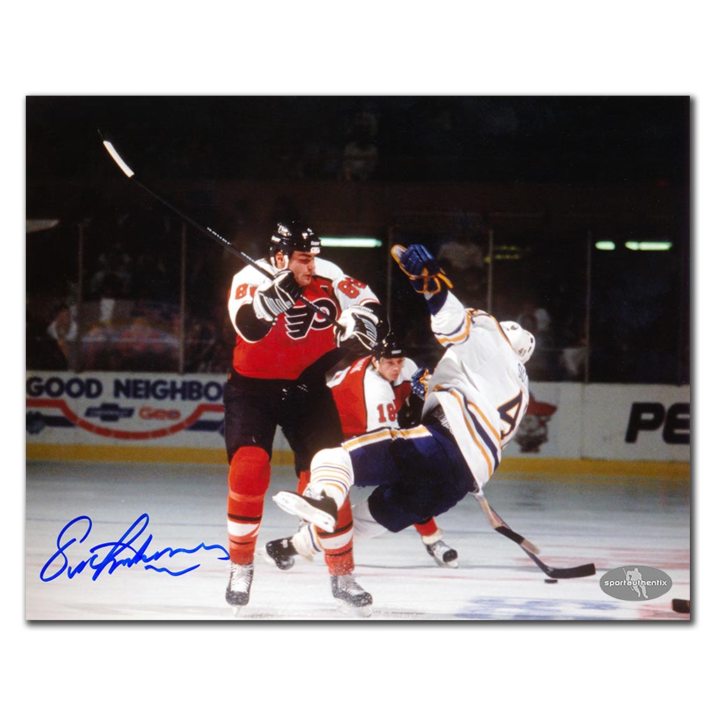 Eric Lindros autographed Philadelphia Flyers 8x10 photo delivering an open-ice hit