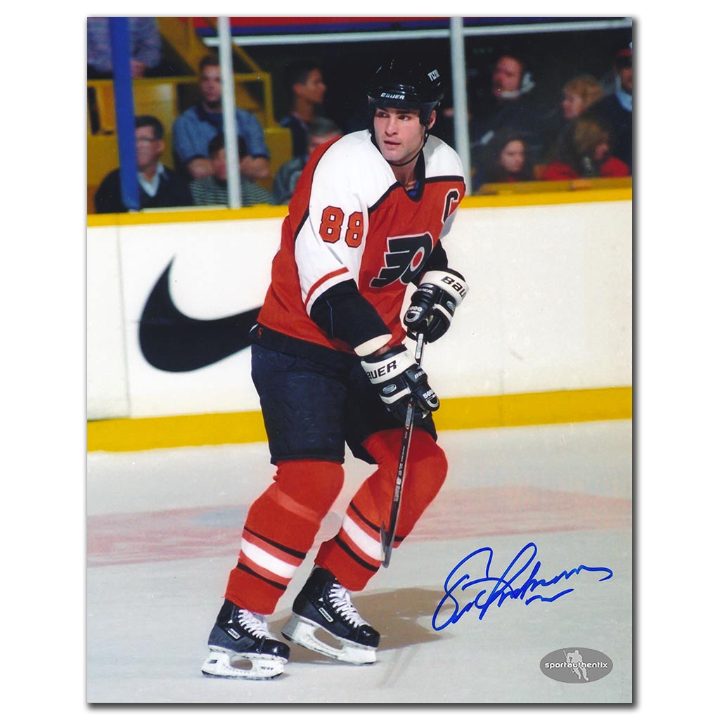 Eric Lindros autographed Philadelphia Flyers 8x10 photo in classic Flyers action pose