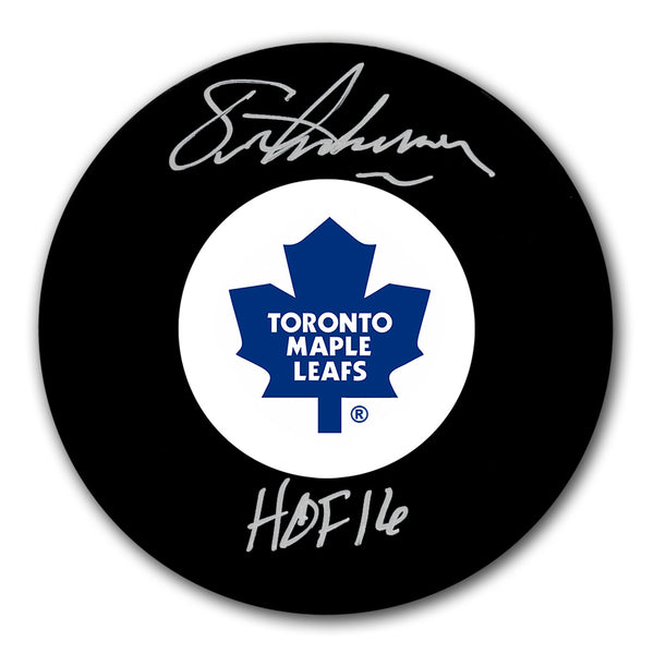 Eric Lindros autographed Toronto Maple Leafs hockey puck with HOF 16 inscription