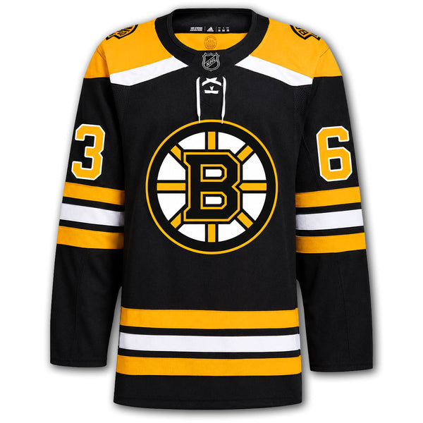 Brad Marchand autographed Boston Bruins Adidas Pro jersey front with black home styling, Bruins crest, NHL shield and number 63 on the sleeves