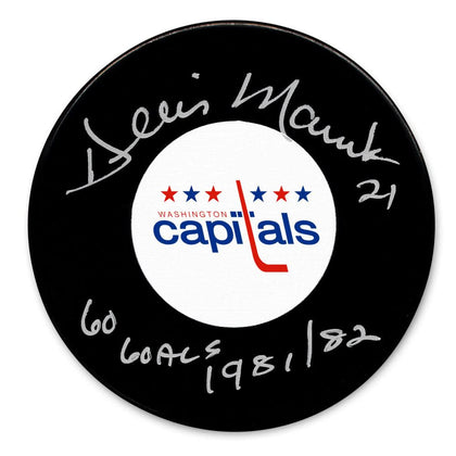 Dennis Maruk signed Washington Capitals hockey puck with 60 Goals 1981/82 inscription and team logo displayed on the puck.