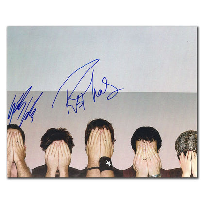 A dual-signed 8x10 photo by Rob Thomas and Kyle Cook from MATCHBOX 20 appears at the top, with five people below covering their faces.