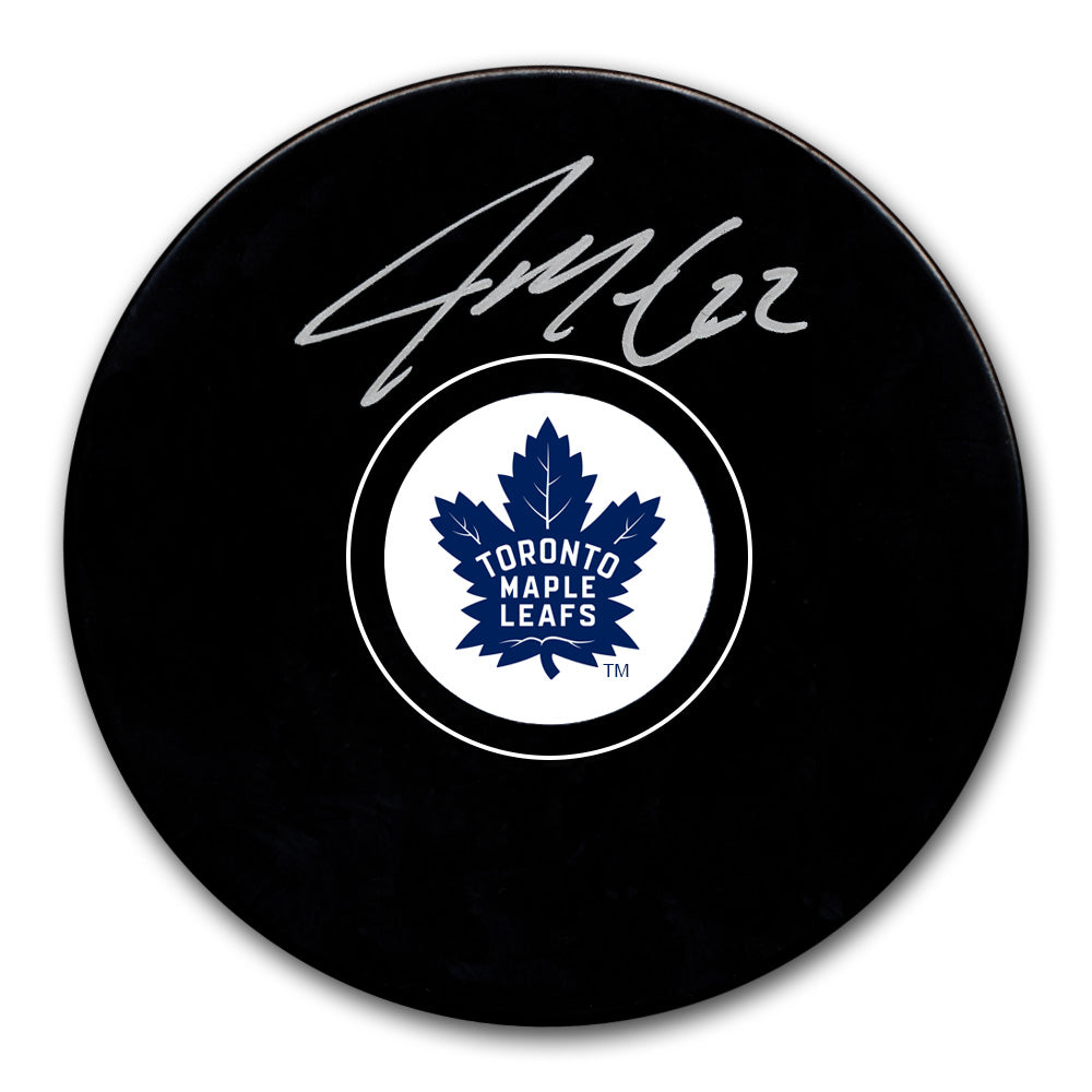 Jake McCabe autographed Toronto Maple Leafs hockey puck with silver signature