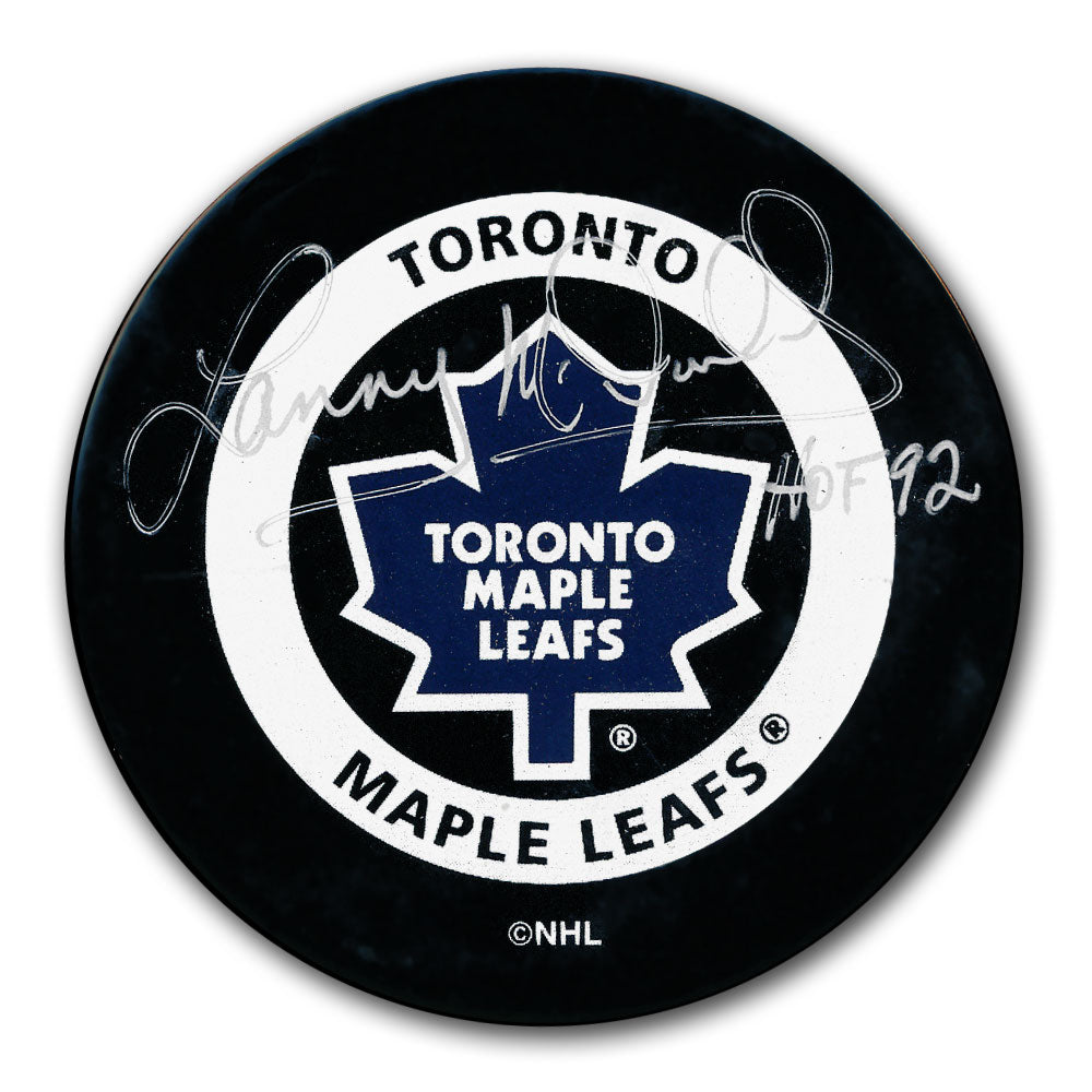Rondelle de jeu officielle autographiée par Lanny McDonald des Maple Leafs de Toronto